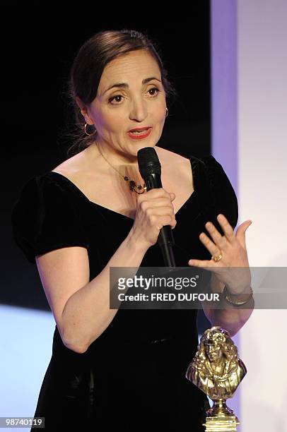 French actress Dominique Blanc delivers a speech after receiving the best actress award for his part in "La Douleur" during the 24th Molieres theatre...