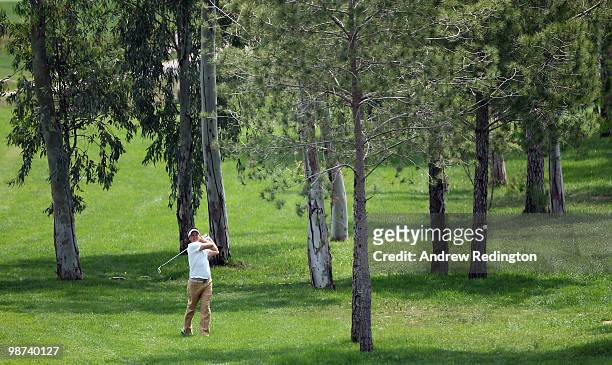 Ally Mellor of England hits his second shot on the 18th hole during the first round of the Turkish Airlines Challenge hosted by Carya Golf Club on...
