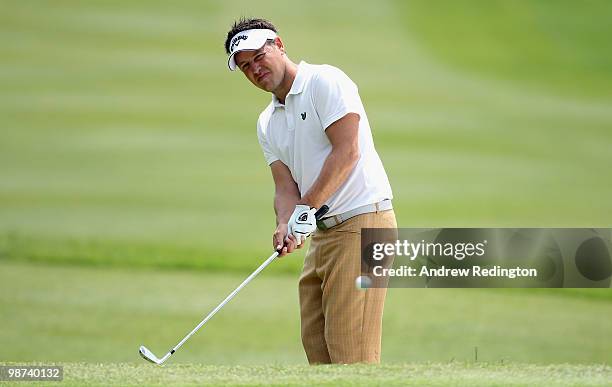 Ally Mellor of England plays a chip shot on the 18th hole during the first round of the Turkish Airlines Challenge hosted by Carya Golf Club on April...