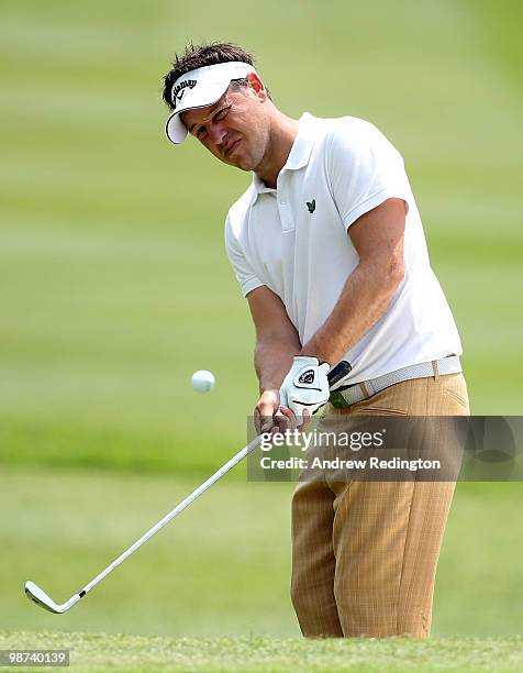 Ally Mellor of England plays a chip shot on the 18th hole during the first round of the Turkish Airlines Challenge hosted by Carya Golf Club on April...