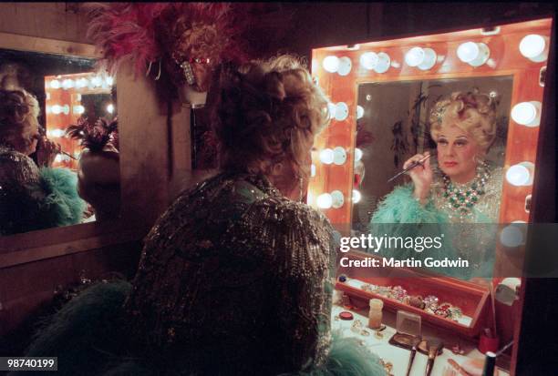Danny la Rue in his changing room at the New Victoria Theatre in Woking, 15th December 2000. Fifteenth December Two Thousand