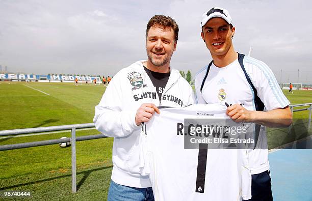 Actor Russell Crowe poses with Cristiano Ronaldo of Real Madrid during a visit to Valdebebas on April 29, 2010 in Madrid, Spain.