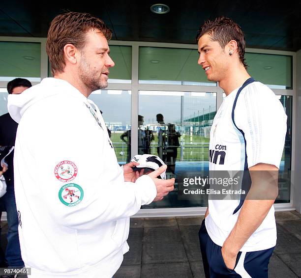 Actor Russell Crowe talks to Cristiano Ronaldo of Real Madrid during a visit to Valdebebas on April 29, 2010 in Madrid, Spain.