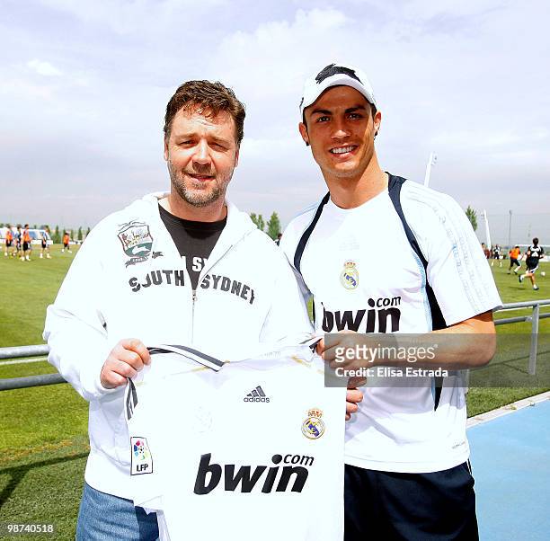 Actor Russell Crowe poses with Cristiano Ronaldo of Real Madrid during a visit to Valdebebas on April 29, 2010 in Madrid, Spain.