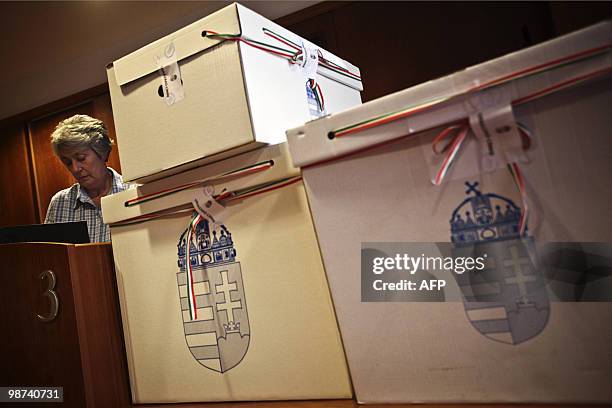 Local woman prepares her ballot at a polling station of Budapest on April 25, 2010 during the second round of the general election. A center-right...