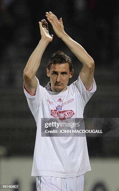 Bayern Munich's striker Miroslav Klose celebrates at the end of the second leg UEFA Champions League semi-final football match Olympique Lyonnais vs...