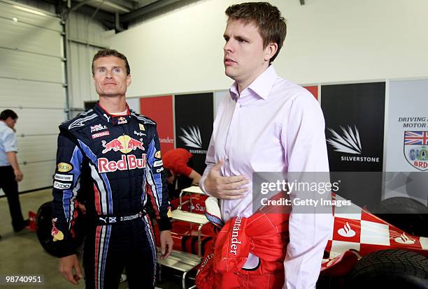 Commentator Jake Humphrey prepares to climb into a specially converted two seater car for a few laps with David Coulthard during the launch of the...