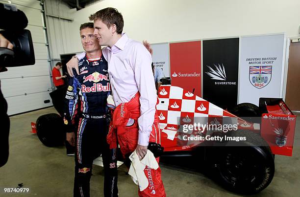 Commentator Jake Humphrey prepares to climb into a specially converted two seater car for a few laps with David Coulthard during the launch of the...