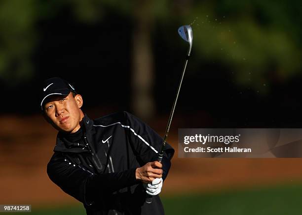 Anthony Kim hits his approach shot on the fifth hole during the first round of the 2010 Quail Hollow Championship at the Quail Hollow Club on April...