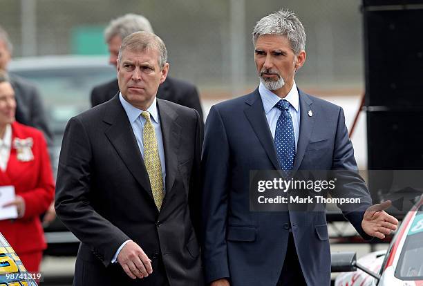 Prince Andrew, The Duke of York is greeted by Damon Hill, the President of the BRDC during the launch of the new Grand Prix circuit at Silverstone on...