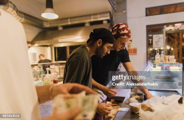 taking orders - greek chef stock pictures, royalty-free photos & images