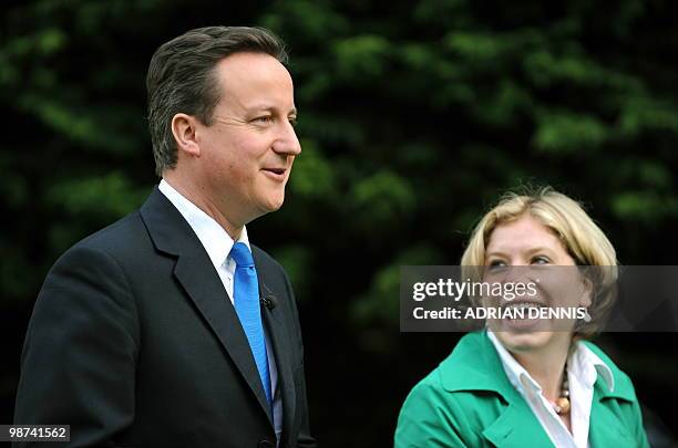 British Opposition Conservative Party Leader David Cameron and Conservative Party candidate Hannah Foster arrive for a breakfast meeting with...