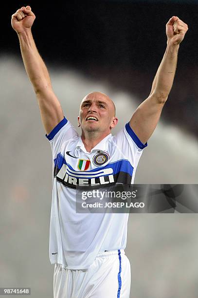 Inter Milan's Argentinian midfielder Esteban Matias Cambiasso celebrates after winning the UEFA Champions League semi-final second leg football match...