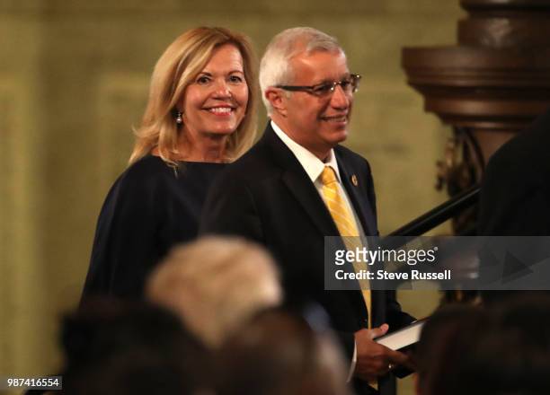 Christine Elliott, deputy premier and health minister and Vic Fedeli, finance minister arrive at the swearing in ceremony. Doug Ford is sworn in as...