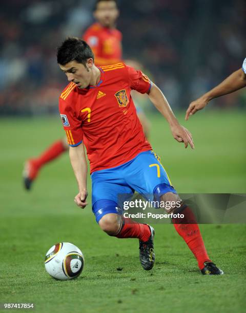 David Villa of Spain in action during the FIFA World Cup Group H match between Spain and Honduras at Ellis Park on June 21, 2010 in Johannesburg,...