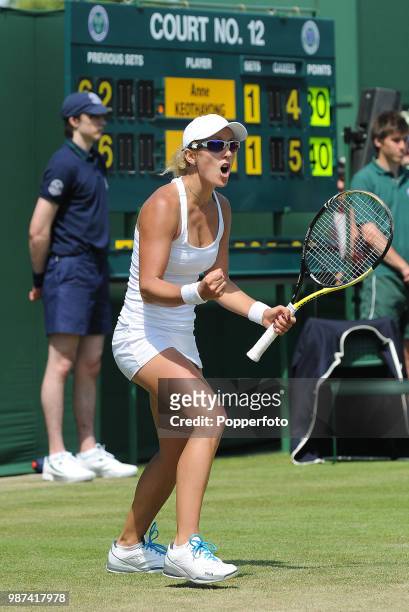 Anastasia Rodionova of Australia celebrates after beating Anne Keothavong of Great Britain in the Womens Singles first round on day two of the 2010...