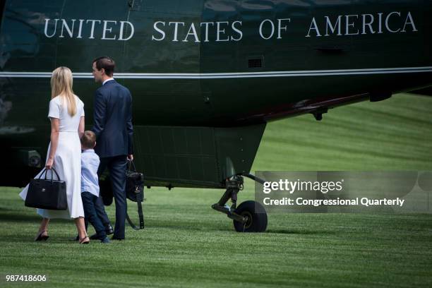 June 29: Ivanka Trump, her son Theodore Kushner and her husband Jared Kushner board Marine One shortly after leaving the White House Friday June 29,...