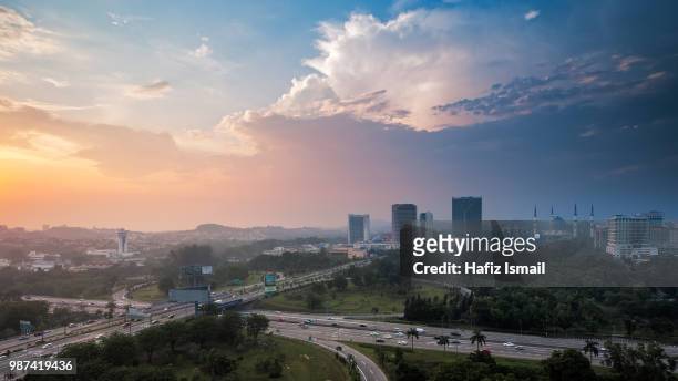 sunset in shah alam - shah alam stock pictures, royalty-free photos & images