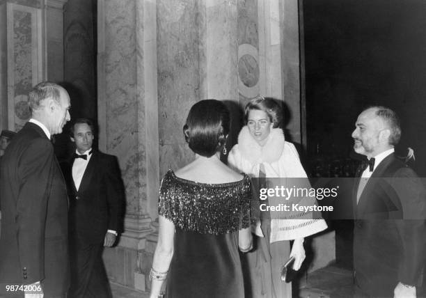 Queen Noor of Jordan greets French First Lady Anne-Aymone Giscard d'Estaing at a gala reception hosted by French President Valery Giscard d'Estaing...