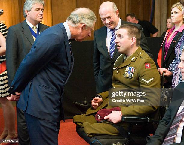 Prince Charles, Prince of Wales meets Lance Bombardier Ben Parkinson and his parents Andrew and Diane who have been helped by ABF The Soldiers'...