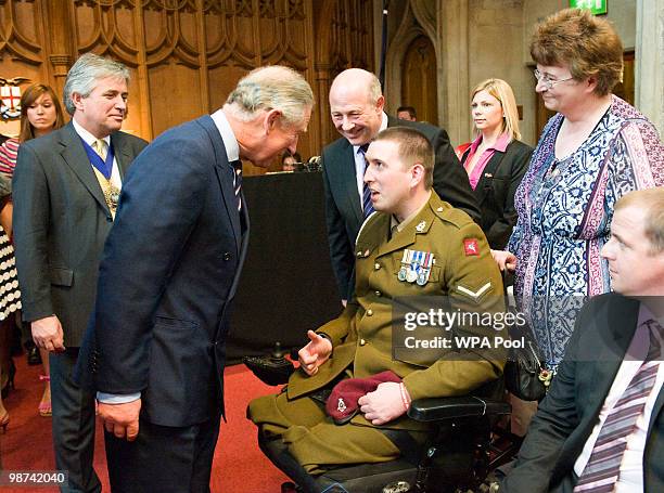 Prince Charles, Prince of Wales meets Lance Bombardier Ben Parkinson and his parents Andrew and Diane who have been helped by ABF The Soldiers'...