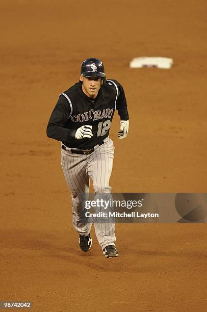 Clint Barmes of the Colorado Rockies runs to third base during a baseball game against the Washington Nationals on April 19, 2010 at Nationals Park...