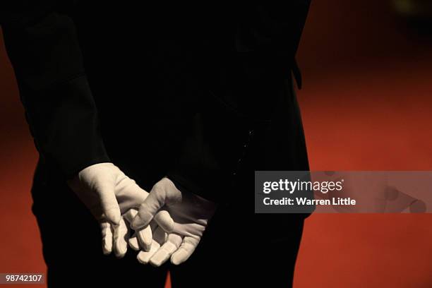 Referee Michaela Tabb keeps an eye on play as Ali Carter of England and Neil Robertson of Australia play the semi final match of the Betfred.com...