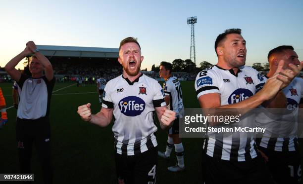Louth , Ireland - 29 June 2018; Sean Hoare, centre, and his Dundalk team-mates, including Brian Gartland, right, celebrate following the SSE...
