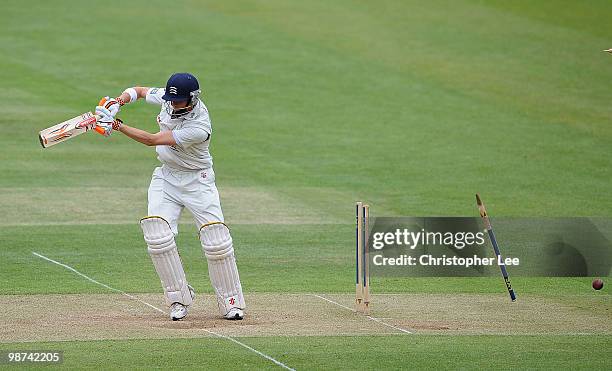 John Simpson of Middlesex is bowled out by Steve Kirby of Gloucestershire during Day Three of the LV County Championship Division Two match between...