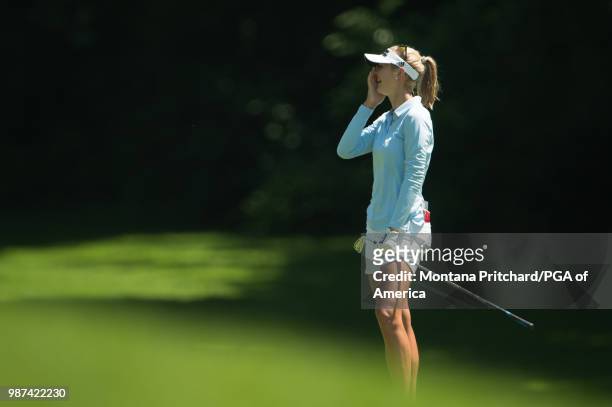 Jessica Korda reacts to her shot on the 12th hole during the second round of the 2018 KPMG Women's PGA Championship at Kemper Lakes Golf Club on June...