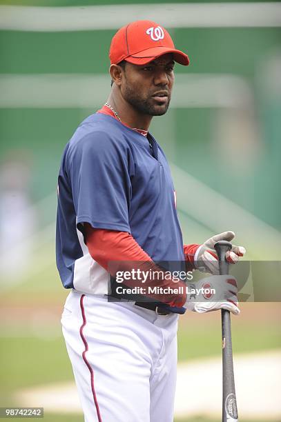 Willy Taveras of the Washington Nationals looks on during batting practice of a baseball game against the Los Angeles Dodgers on April 25, 2010 at...