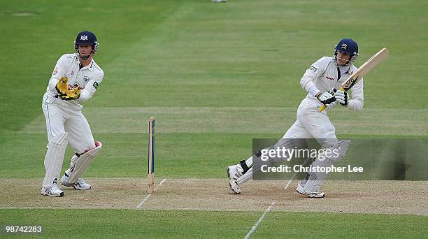 Dawid Malan of Middlesex in action as Jonathan Batty of Gloucestershire watches during Day Three of the LV County Championship Division Two match...