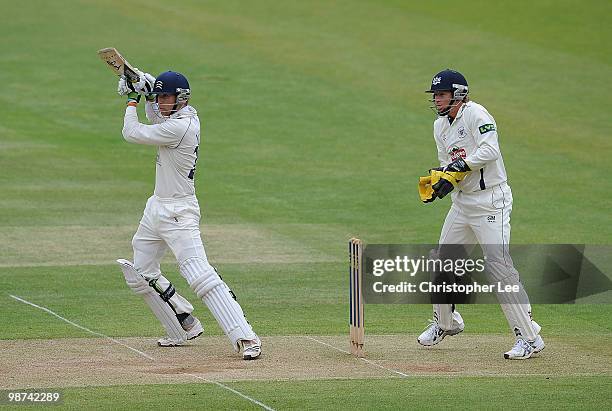 Dawid Malan of Middlesex in action as Jonathan Batty of Gloucestershire watches during Day Three of the LV County Championship Division Two match...