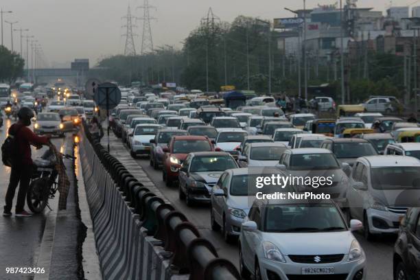 Traffic jam is seen in Gurgaon some 30 km south of New Delhi on 29 June 2019 after a heavy rain.