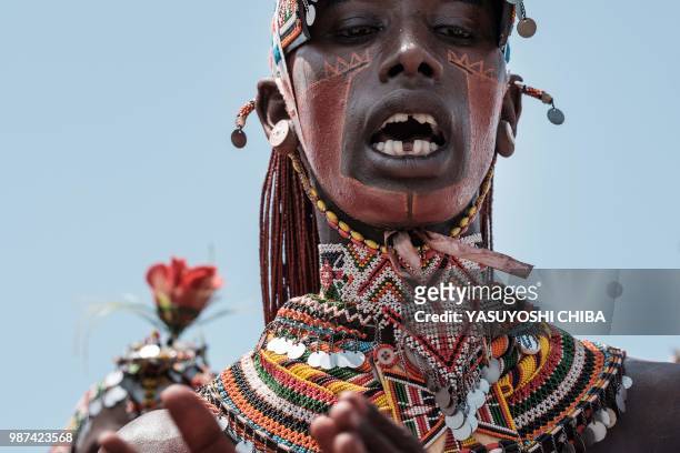 Man of the Samburu tribe sings during the 11th Marsabit Lake Turkana Culture Festival in Loiyangalani near Lake Turkana, northern Kenya, on June 28,...
