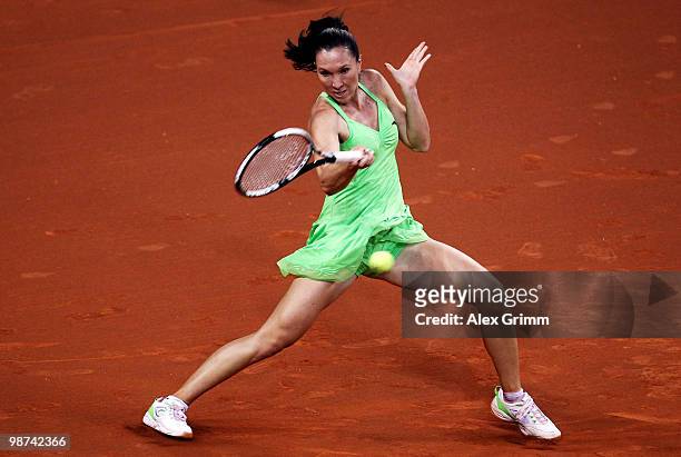 Jelena Jankovic of Serbia plays a forehand during her second round match against Tsvetana Pironkova of Bulgaria at day four of the WTA Porsche Tennis...