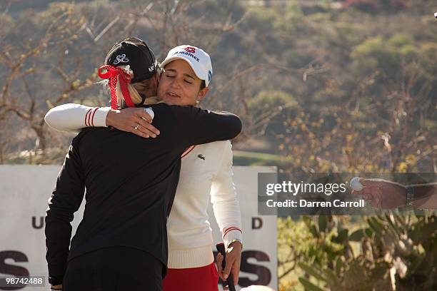 Lorena Ochoa of Mexico hugs playing partner Natalie Gulbis prior to the start of the first round of the Tres Marias Championship at the Tres Marias...