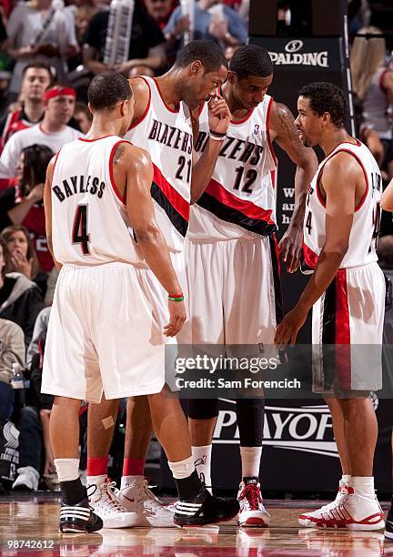 Jerryd Bayless, Marcus Camby, LaMarcus Aldridge and Andre Miller of the Portland Trail Blazers huddle on the court in Game Four of the Western...