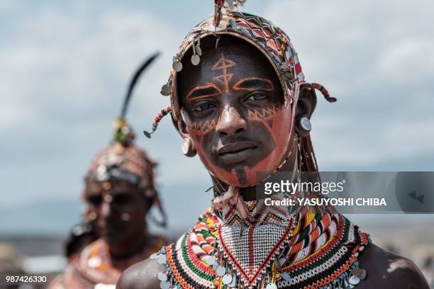 Man of the Samburu tribe poses during the 11th Marsabit Lake Turkana Culture Festival in Loiyangalani near Lake Turkana, northern Kenya, on June 28,...