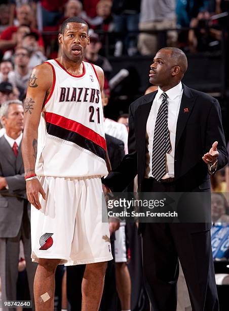 Marcus Camby of the Portland Trail Blazers listens to head coach Nate McMillan in Game Four of the Western Conference Quarterfinals against the...