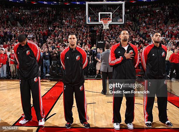 LaMarcus Aldridge, Brandon Roy, Juwan Howard and Nicolas Batum of the Portland Trail Blazers stand for the national anthem prior to Game Four of the...