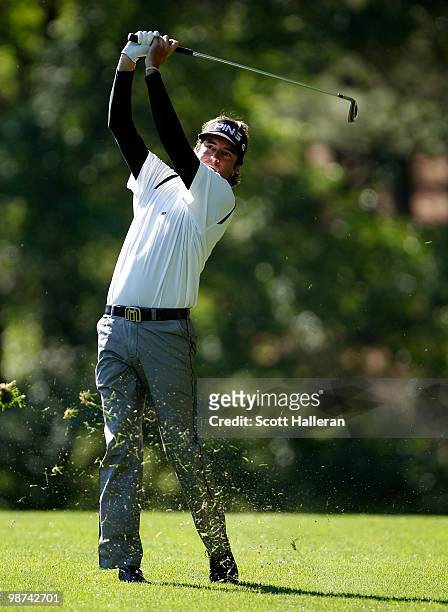 Bubba Watson hits his approach shot on the fourth hole during the first round of the 2010 Quail Hollow Championship at the Quail Hollow Club on April...