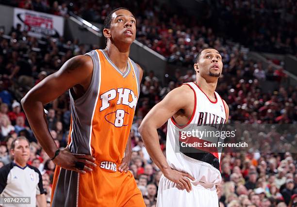 Channing Frye of the Phoenix Suns and Brandon Roy of the Portland Trail Blazers look on in Game Four of the Western Conference Quarterfinals during...