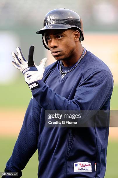 Curtis Granderson of the New York Yankees warms up before the game against the Baltimore Orioles at Camden Yards on April 27, 2010 in Baltimore,...