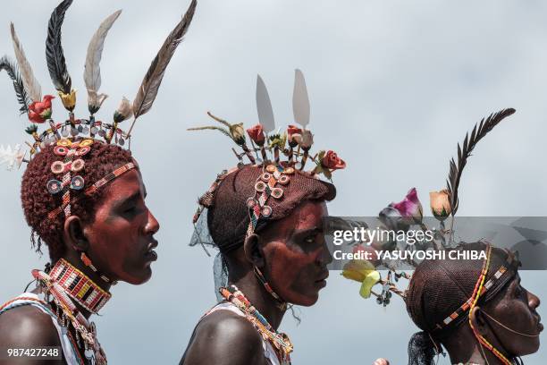 Men of the Samburu tribe perform during the 11th Marsabit Lake Turkana Culture Festival in Loiyangalani near Lake Turkana, northern Kenya, on June...