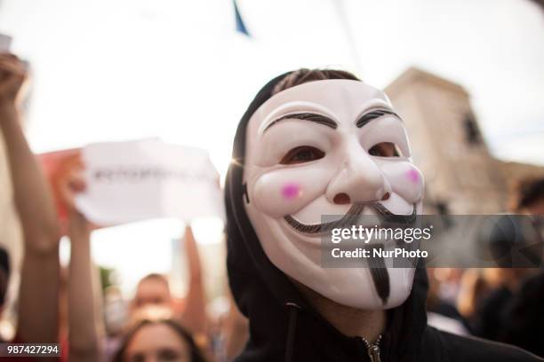 Man in Anonymous mask during protest against ACTA 2.0 in Warsaw in Warsaw on June 29, 2018.