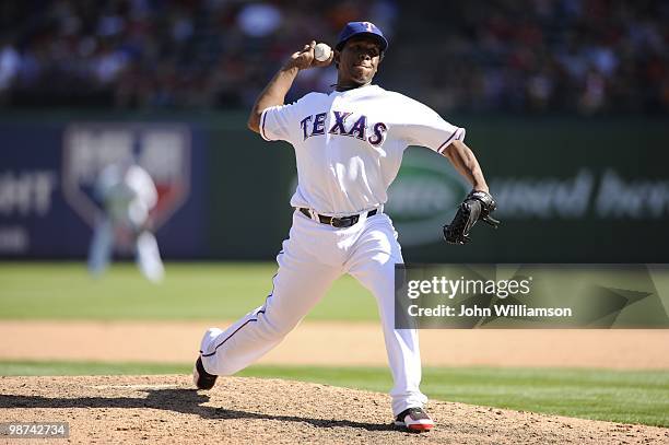 Neftali Feliz of the Texas Rangers pitches during the game against the Detroit Tigers at Rangers Ballpark in Arlington in Arlington, Texas on Sunday,...