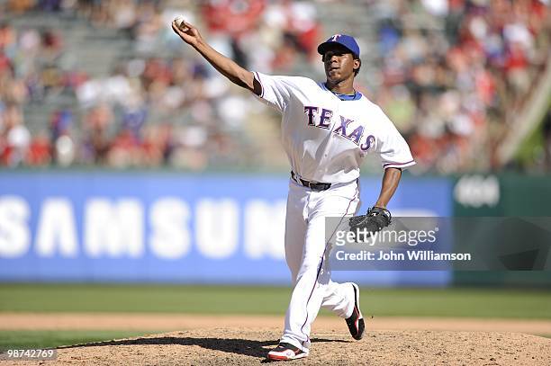 Neftali Feliz of the Texas Rangers pitches during the game against the Detroit Tigers at Rangers Ballpark in Arlington in Arlington, Texas on Sunday,...