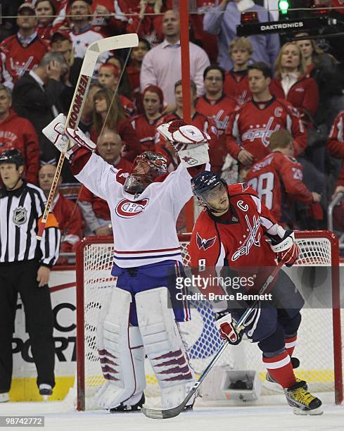 Jaroslav Halak of the Montreal Canadiens celebrates as Alex Ovechkin of the Washington Capitals skates away following the Canadiens 2-1 win in Game...