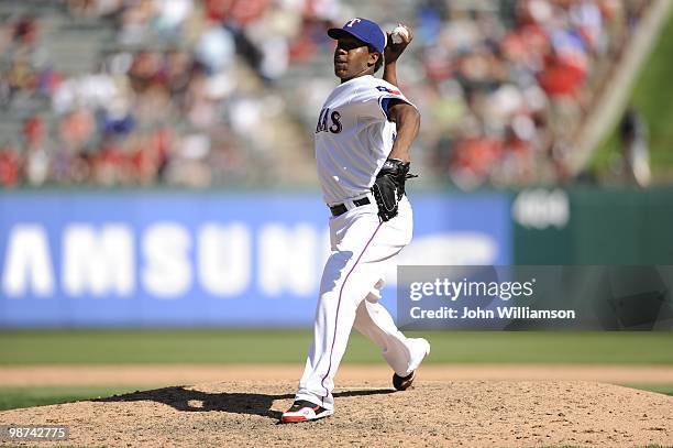 Neftali Feliz of the Texas Rangers pitches during the game against the Detroit Tigers at Rangers Ballpark in Arlington in Arlington, Texas on Sunday,...